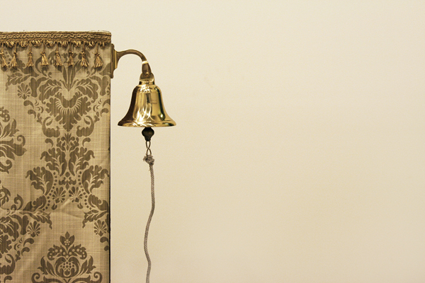 A ship bell used to start a game of Commodore.